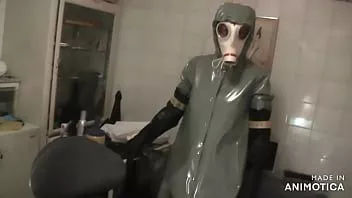 play Rubbernurse agnes - heavy rubber green clinic gown with hood and white gasmask - deep pegging with two colonoscope-style dildos - final deep analfisting with thick chemical gloves and cum